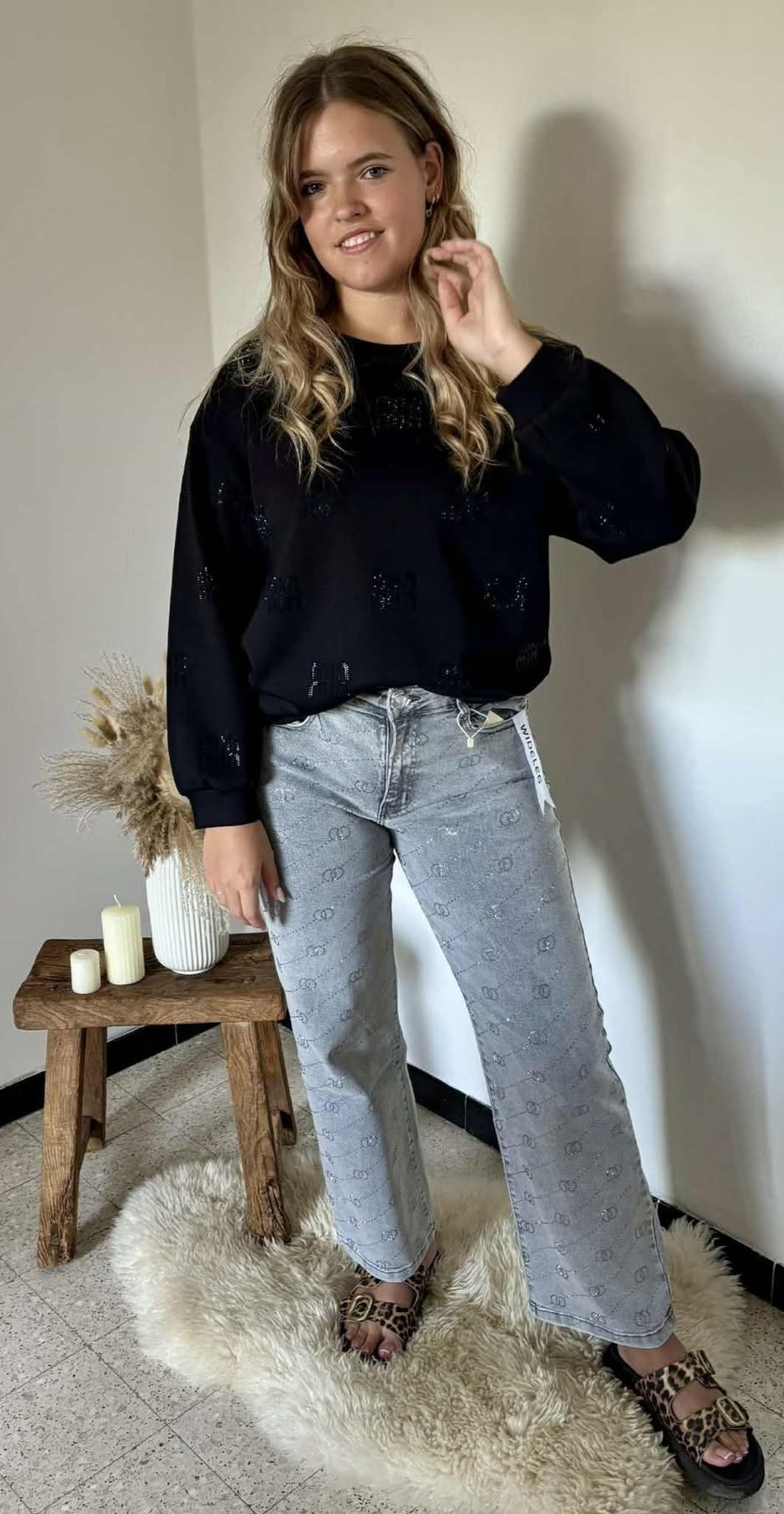 Elegante zwarte sweater met strassteentjes