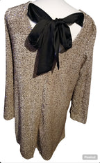 Beige glitterjurk met strik achteraan