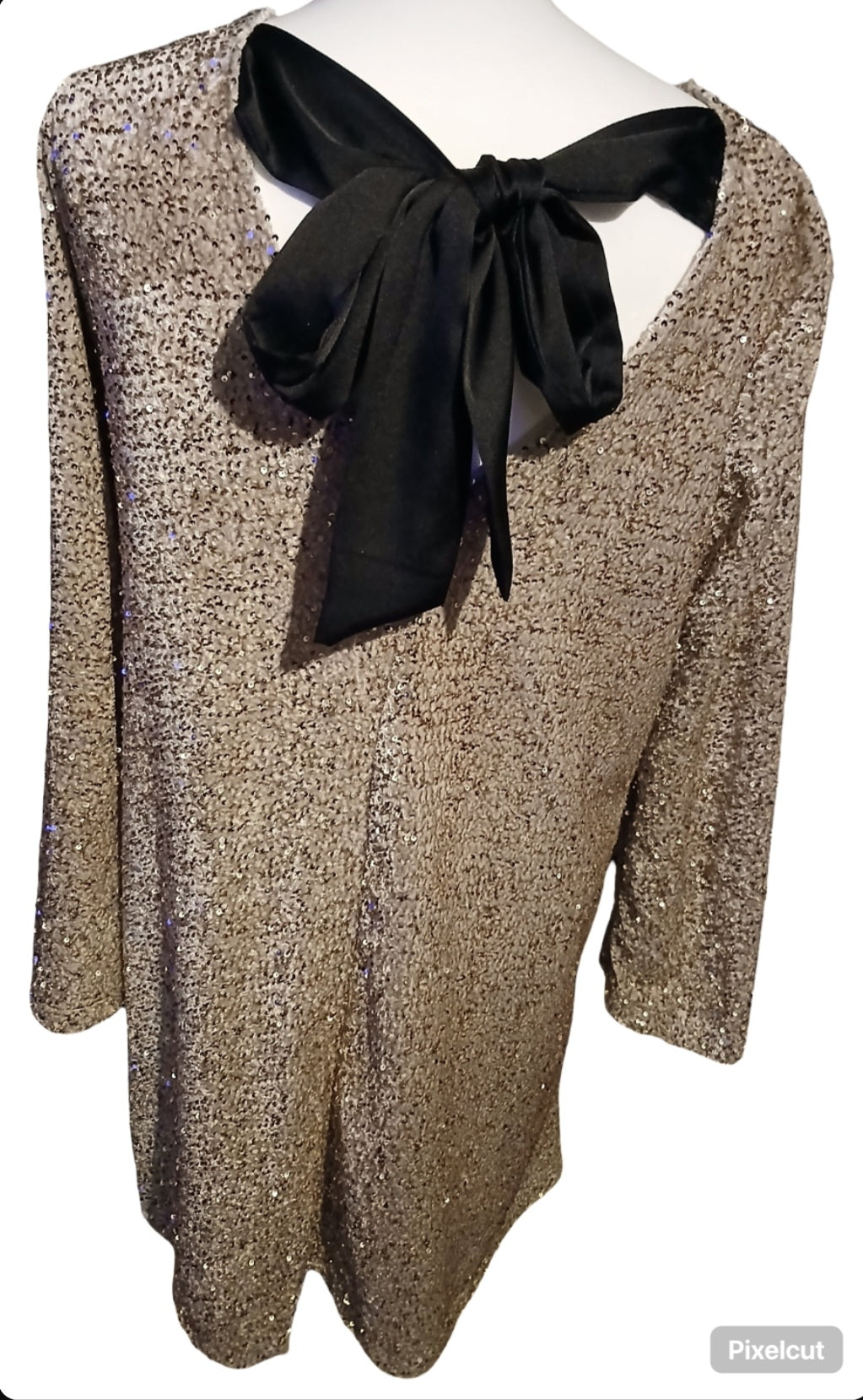 Beige glitterjurk met strik achteraan