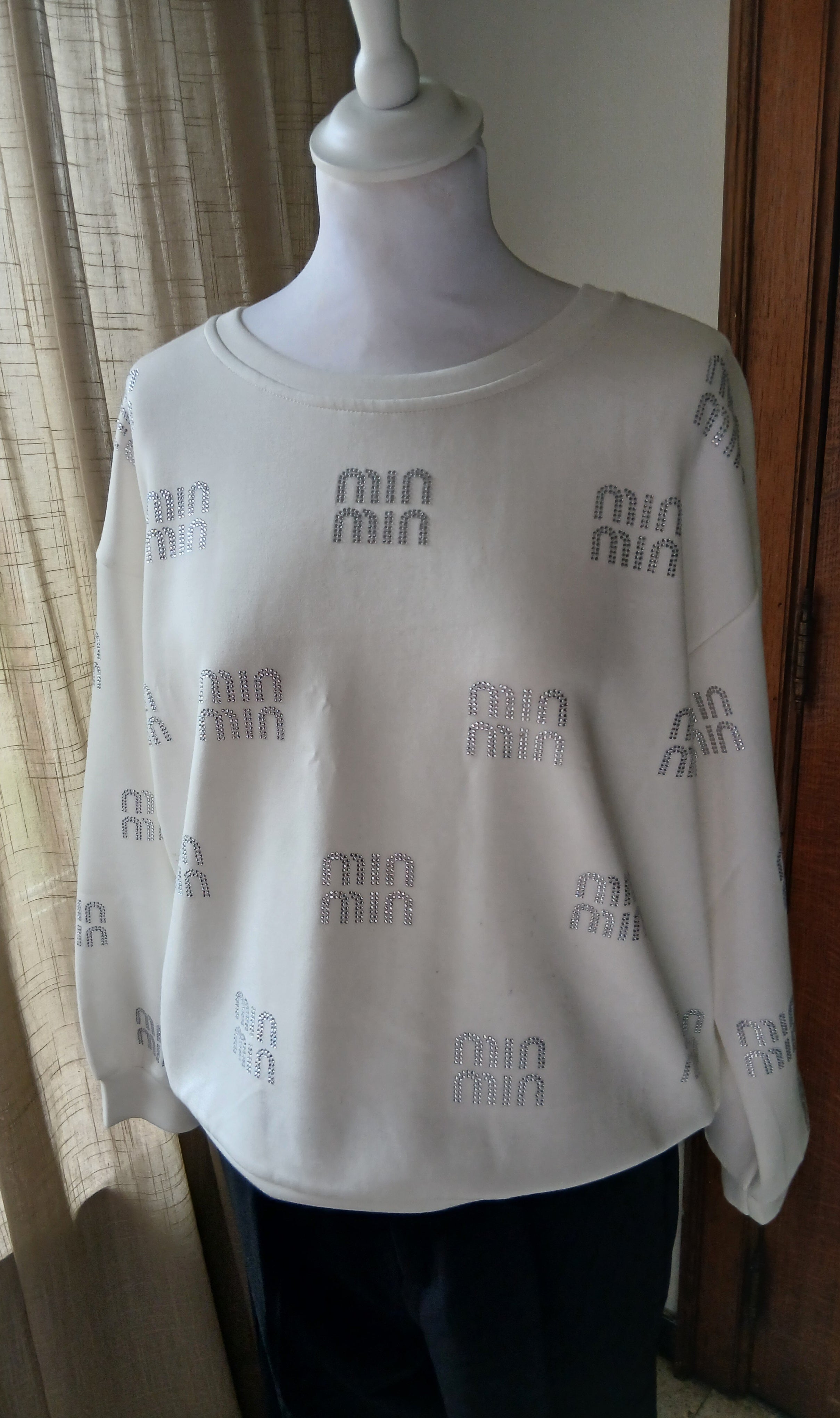 Sweater met strassteentjes